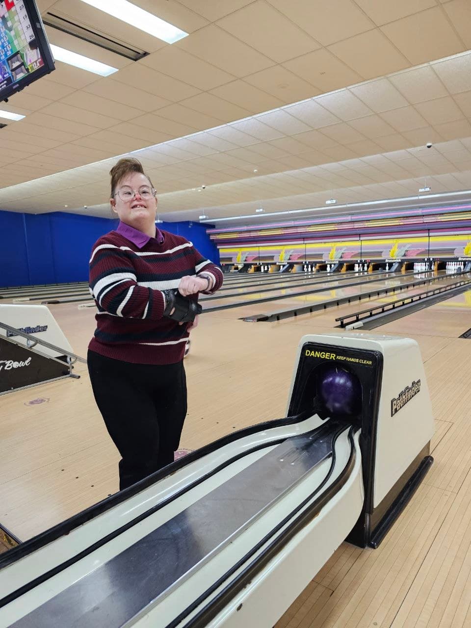 Participant taking part in a bowling activity