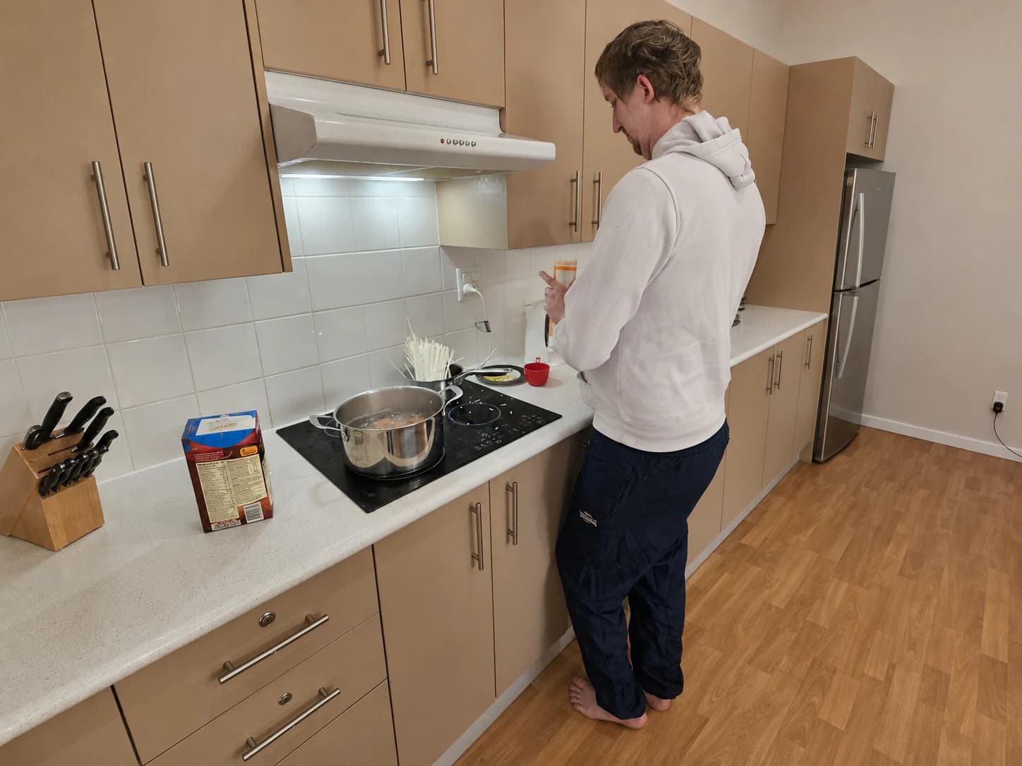 Participant developing confidence through supported meal preparation