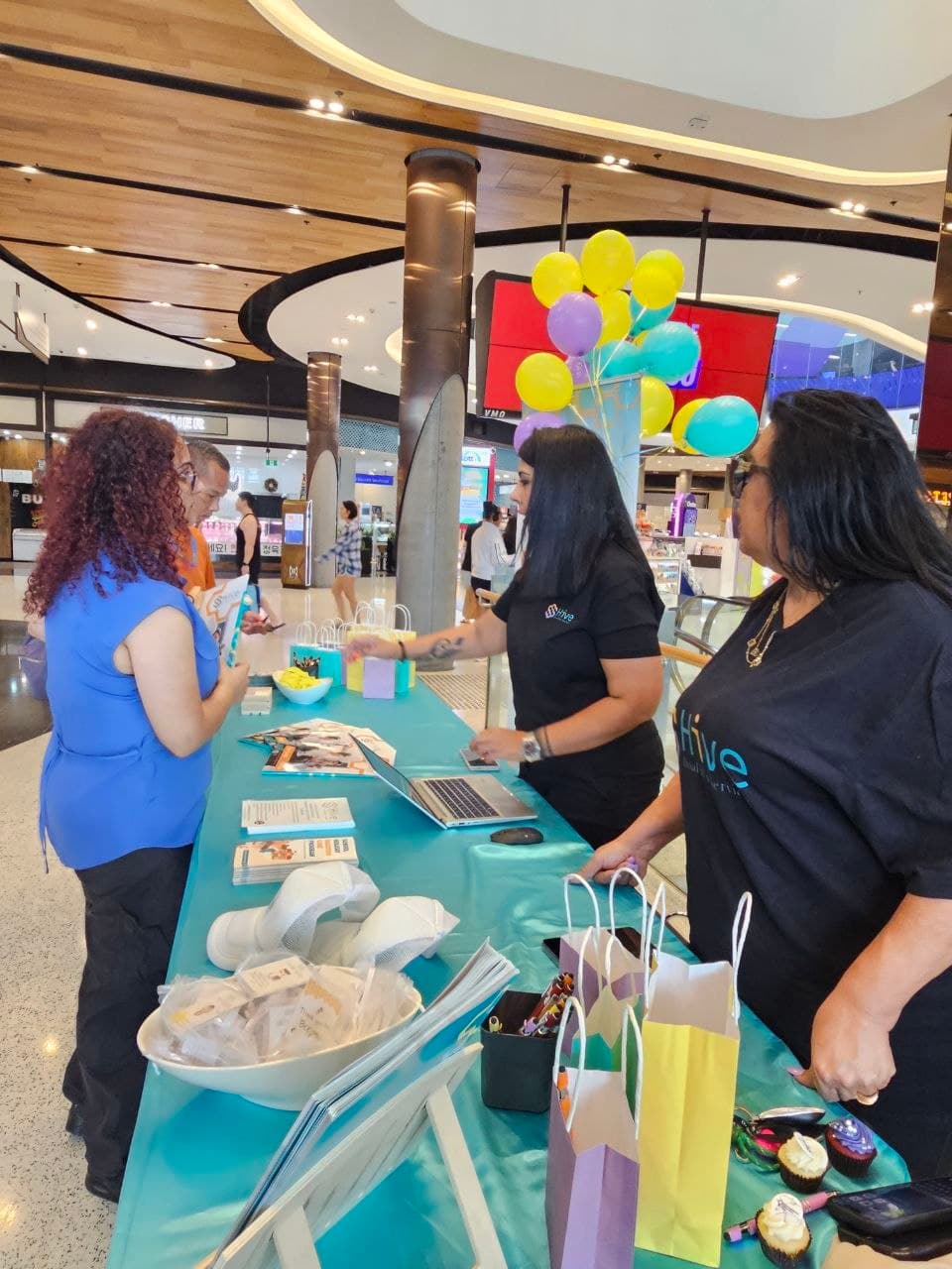 Hive Disability team members meeting people in the local community
