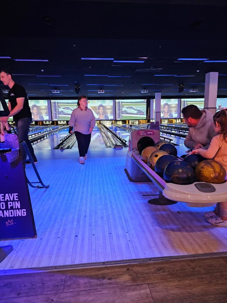 Participants enjoying a supported bowling activity together