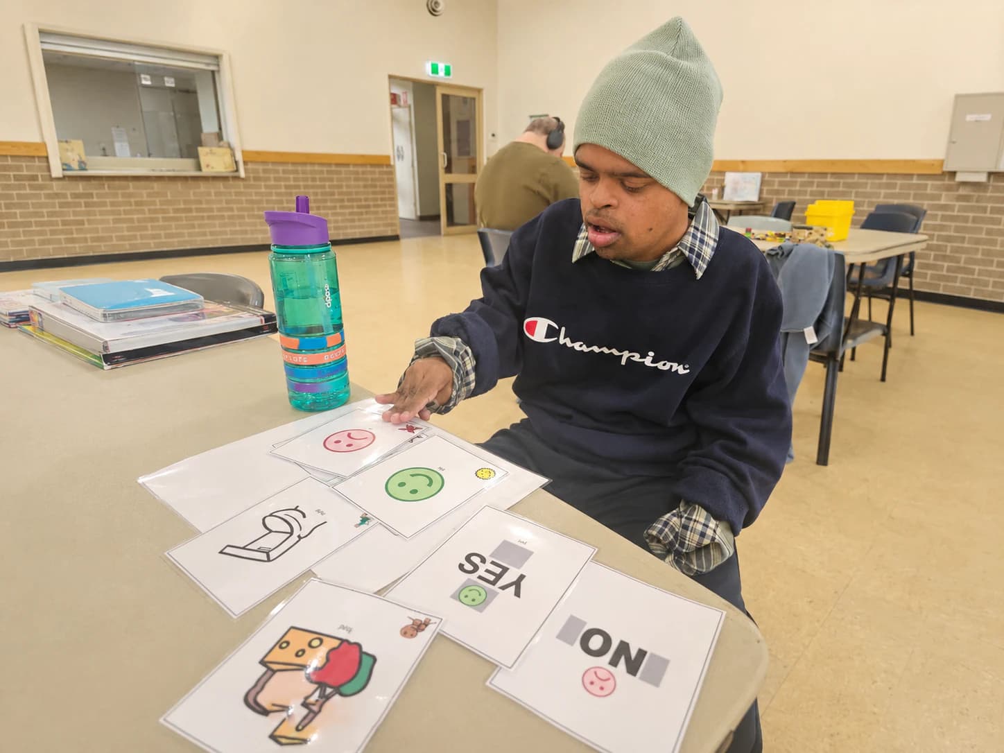 Participant developing communication and everyday learning skills